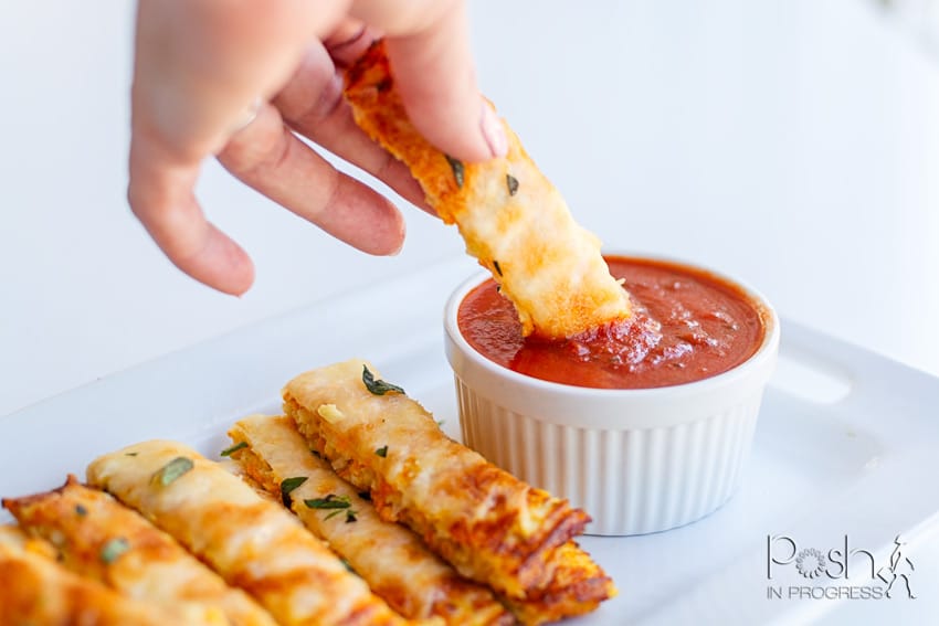 Cheesy Cauliflower Breadsticks Recipe featured by top LA lifestyle blogger, Posh in Progress