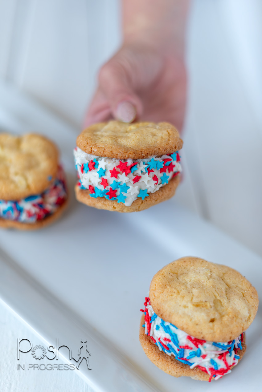 Apple Pie Cookies by popular LA lifestyle blog, Posh in Progress: image of Apple Pie ice cream sandwich cookies with red, white and blue star sprinkles on a white rectangular ceramic plate. 