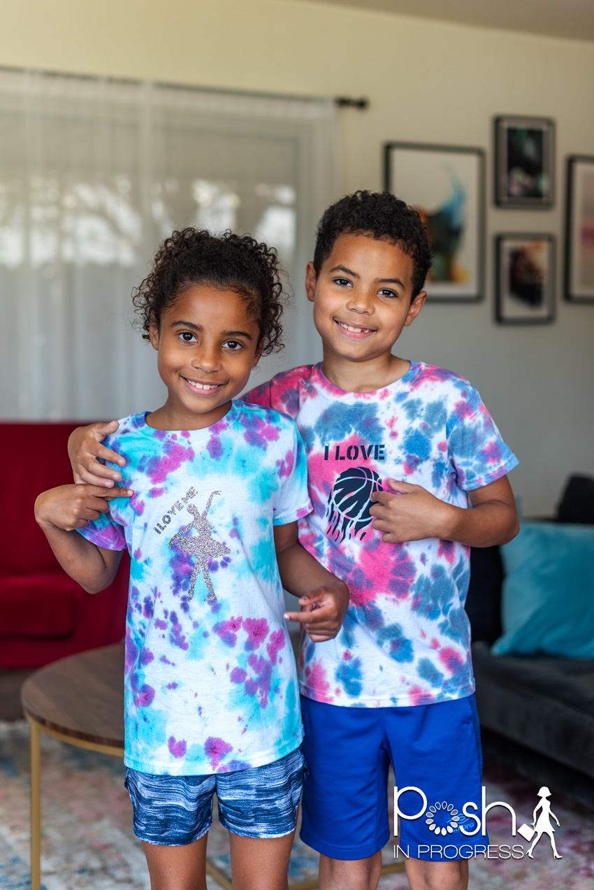 Custom tie dye shirts by popular LA fashion blog, Posh in Progress: image of a young boy and girl standing next to each other and wearing tie dye shirts. 