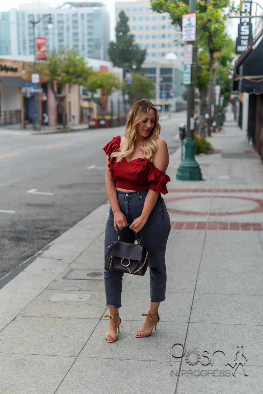 Burgundy top with black 2024 jeans